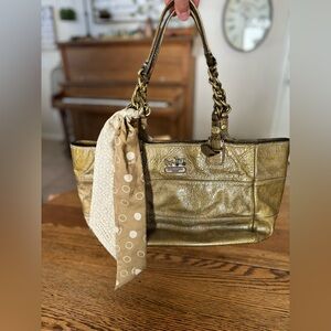 Gold coach purse